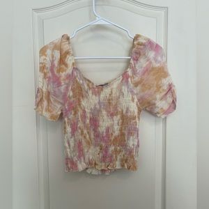 White, pink, purple, and orange tie-dye shirt, small